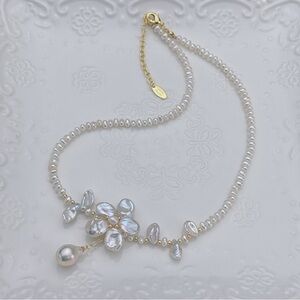 Elegant Pearl Necklace with Gold Accents